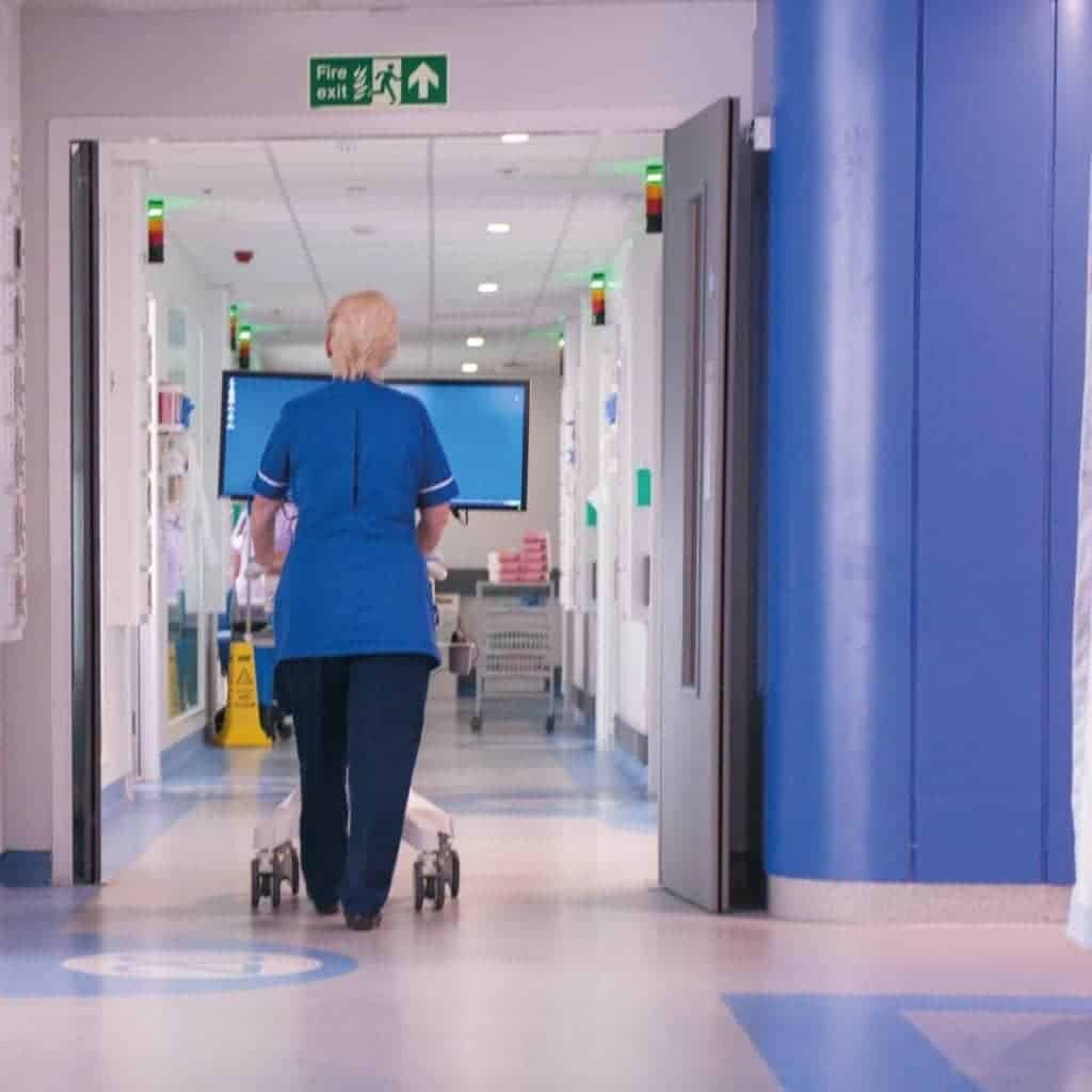 Nurse pushing an Dual Monitor EPR Cart / Trolley at Royal Hallamshire Hospital