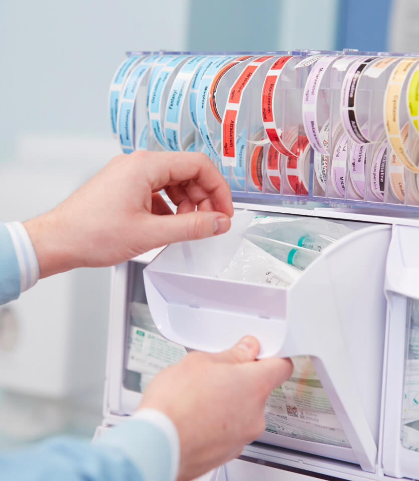 Tilt bins and coloured labels on an Anaesthetic Trolleys at Manchester University Hospital