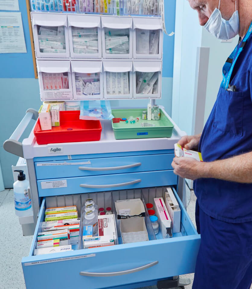 Nurse using Anaesthetic Trolley at Manchester University Hospital