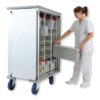 Female hospital staff using an Aluminium Sterile Case Cart with auto-stop rail system